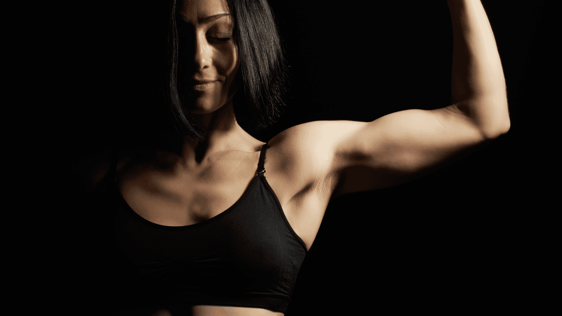 Woman Flexing Her Biceps