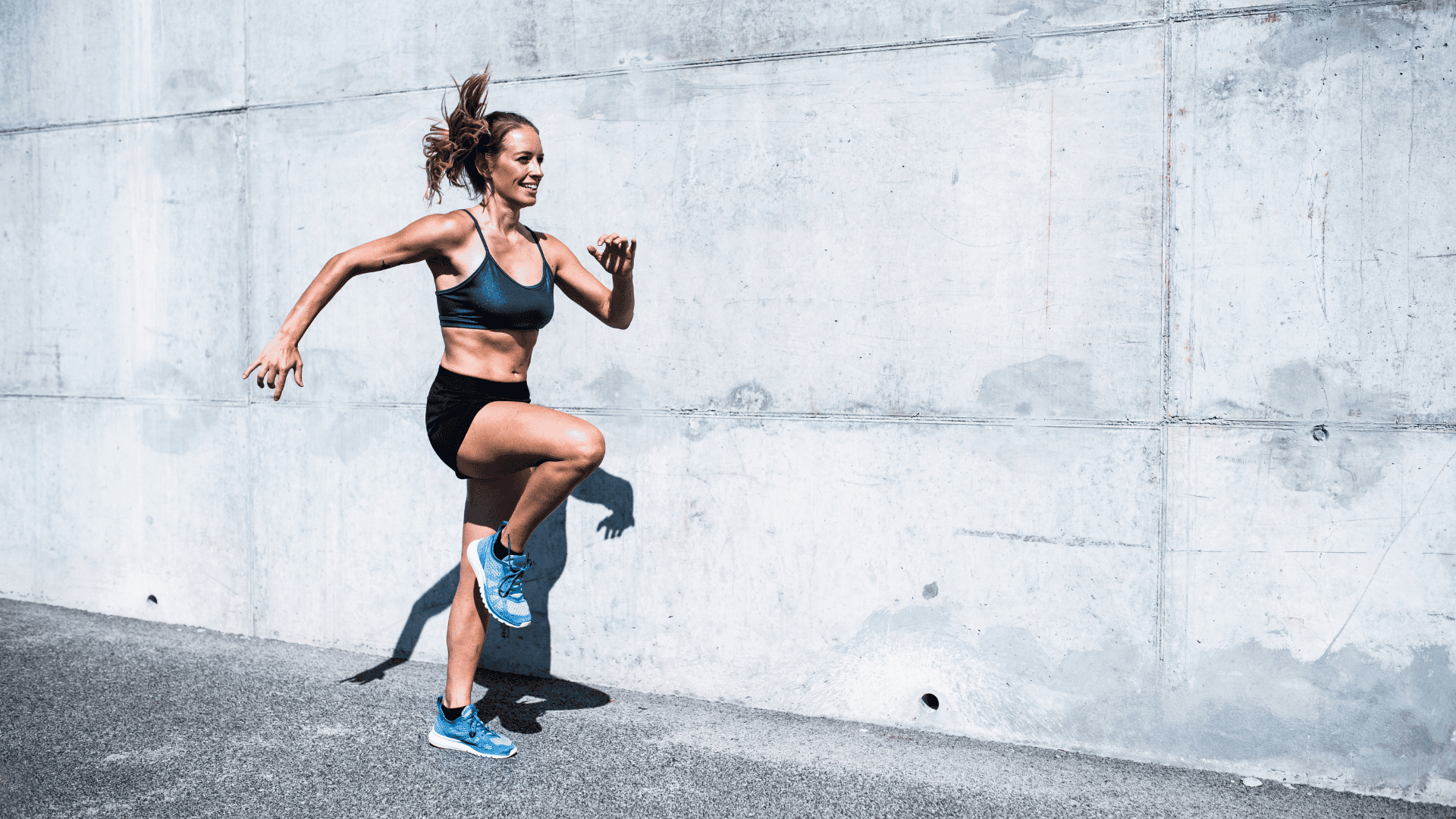 A lady doing HIIT exercises outdoor
