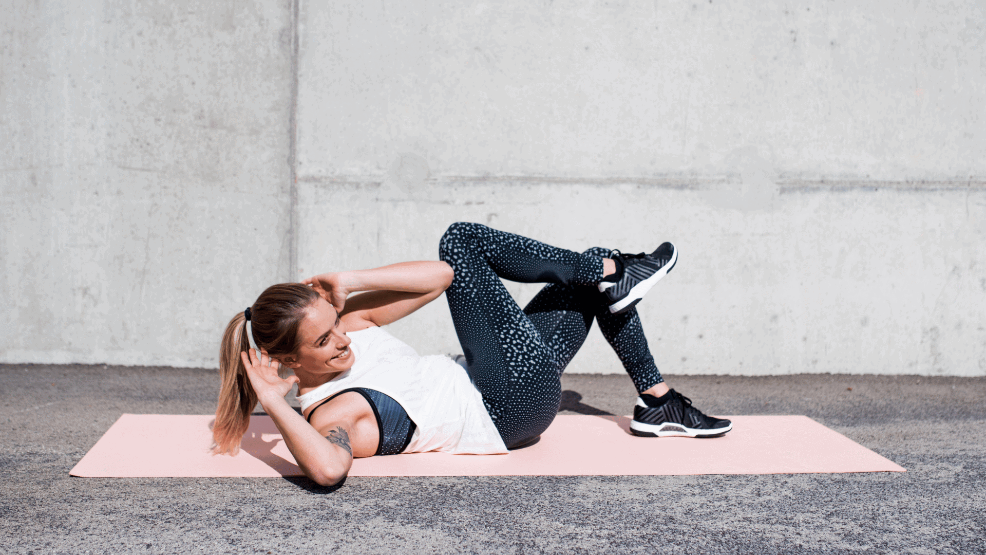 Woman doing bicycle crunch