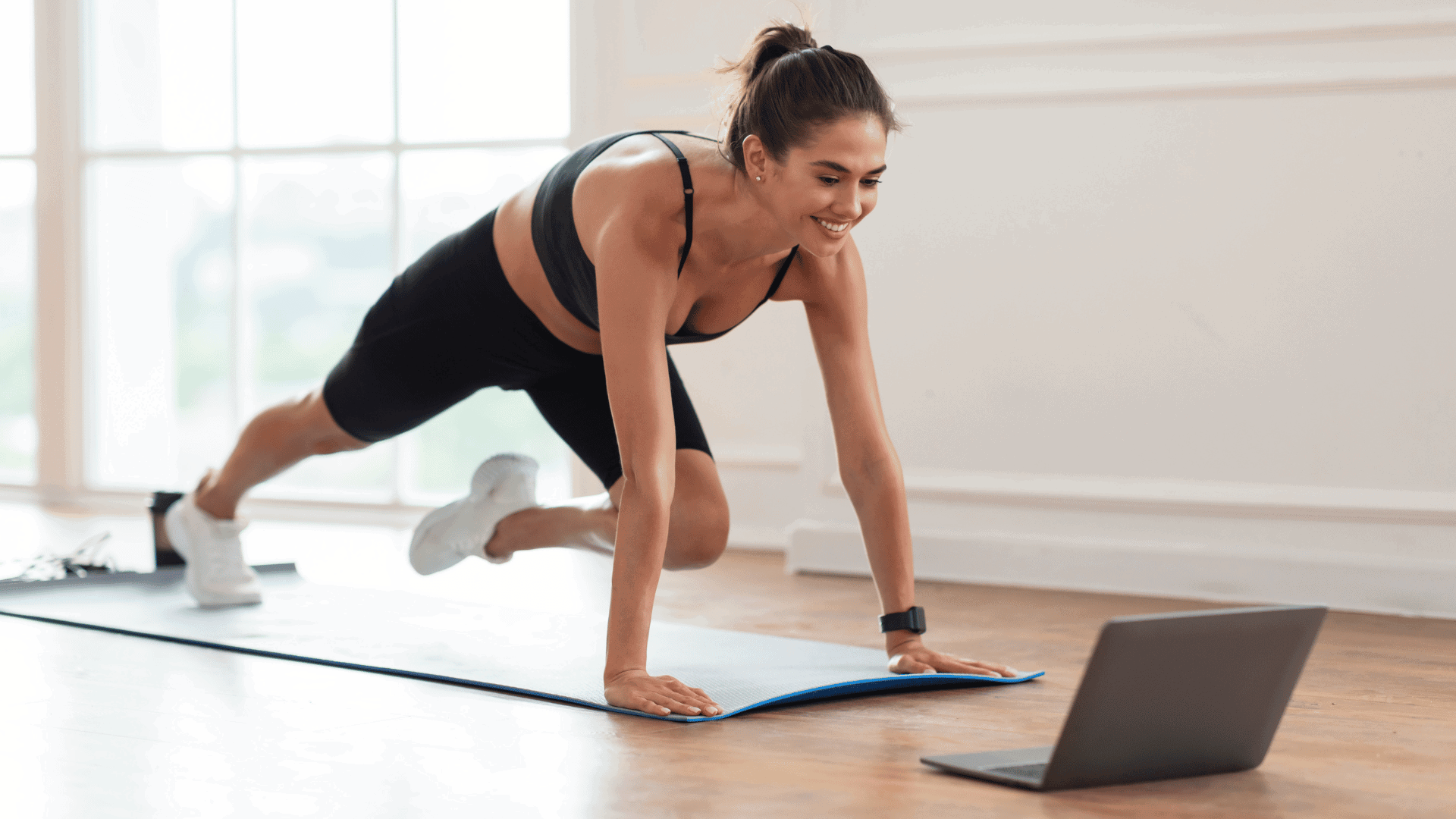 Woman Doing Cross Body Mountain Climbers Exercise