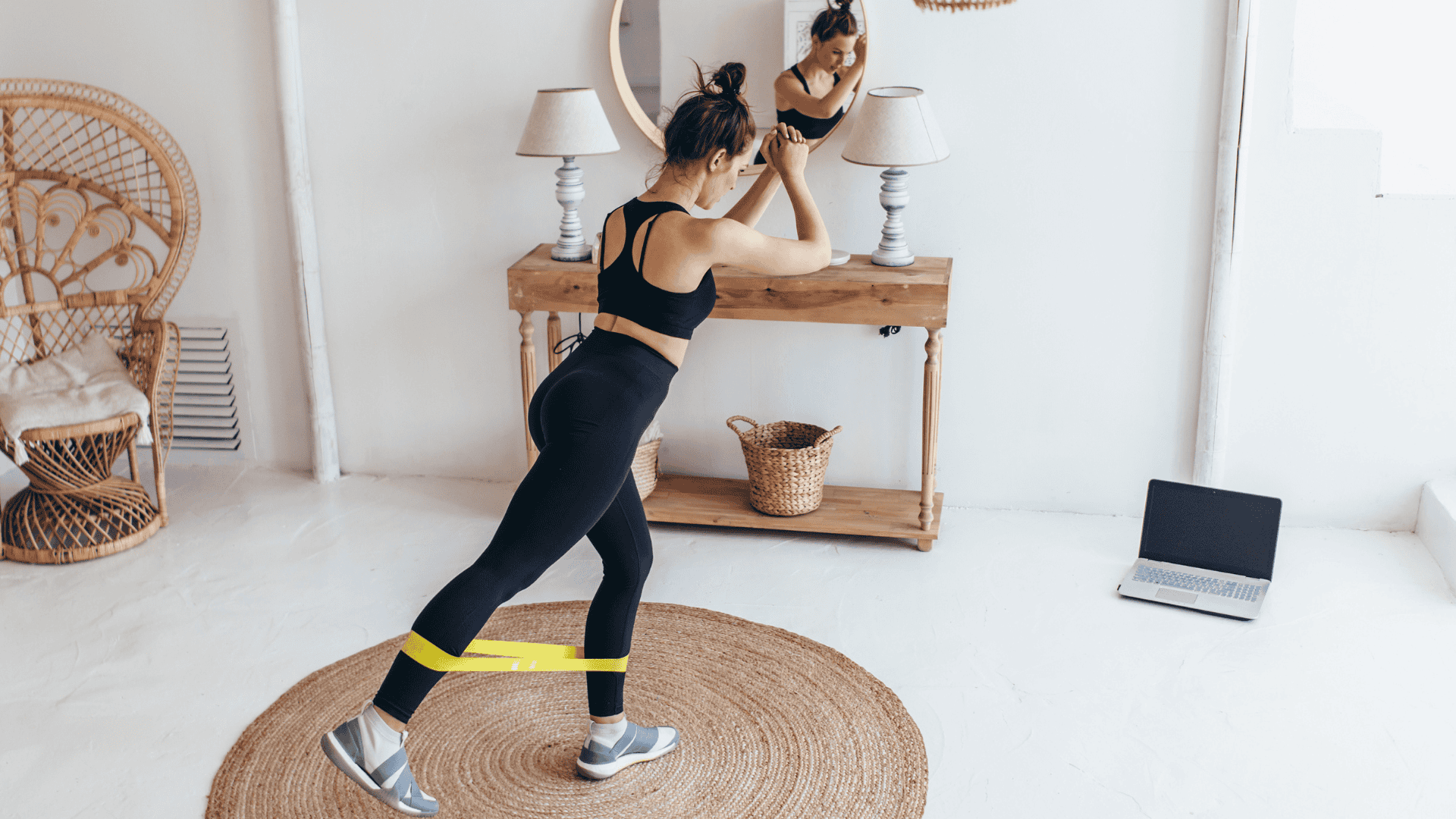 Woman Working Out at Home with Elastic Band