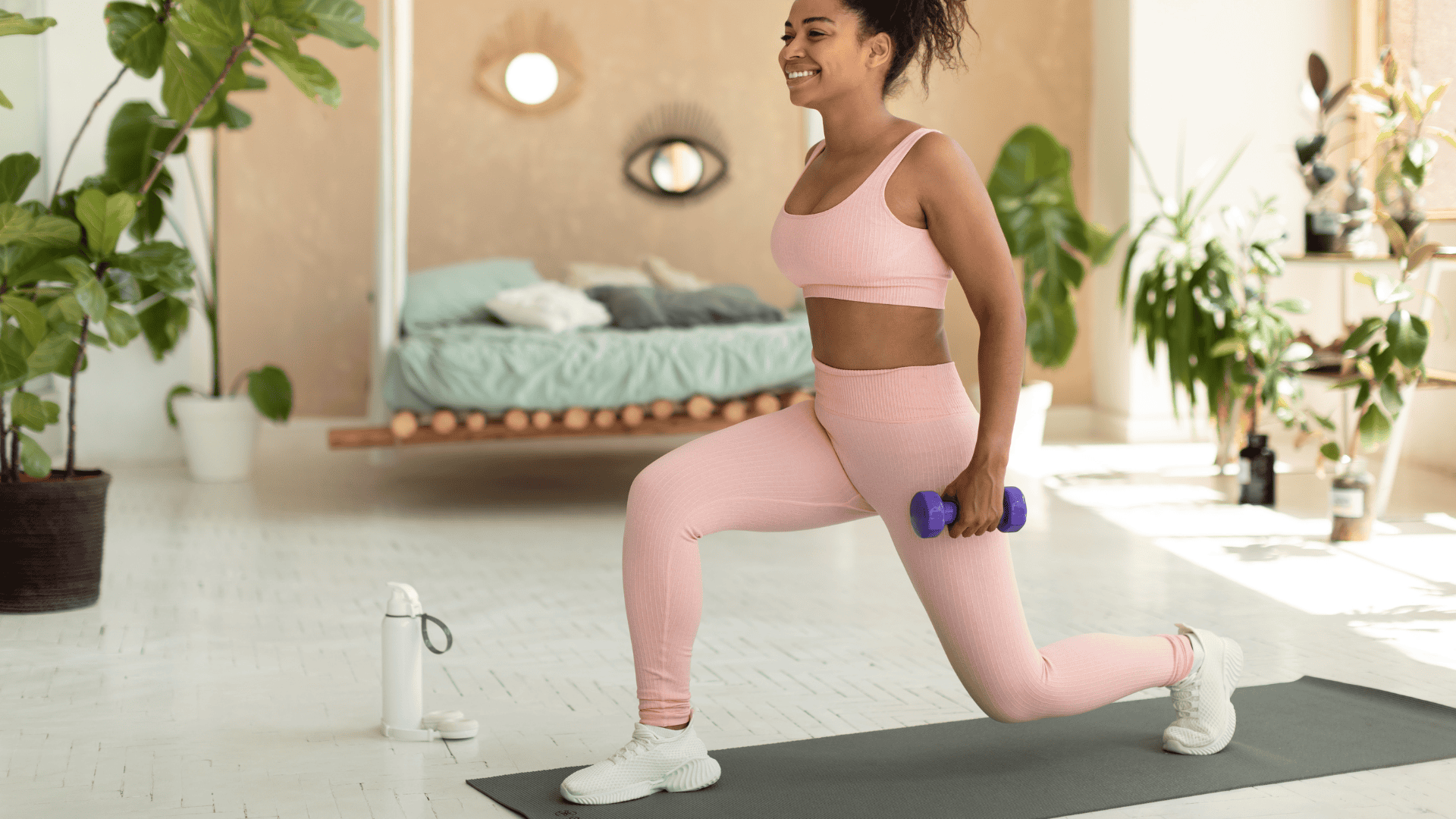 Woman holding a dumbbell workout for leg and core