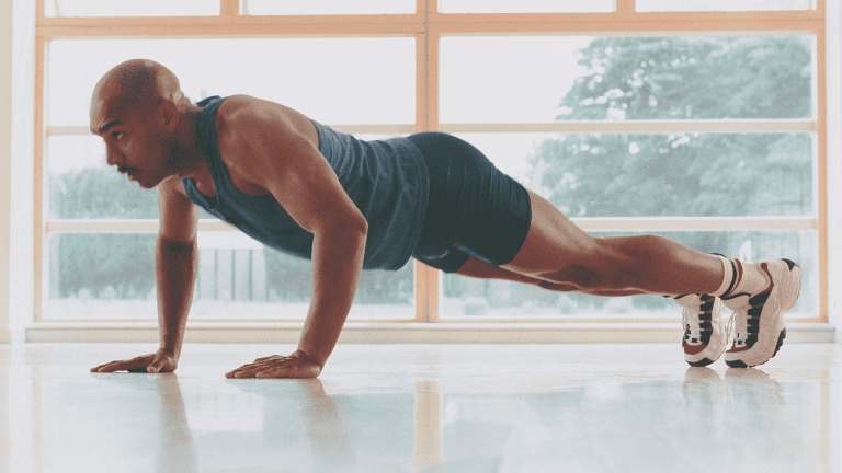 Man performing push-ups at home